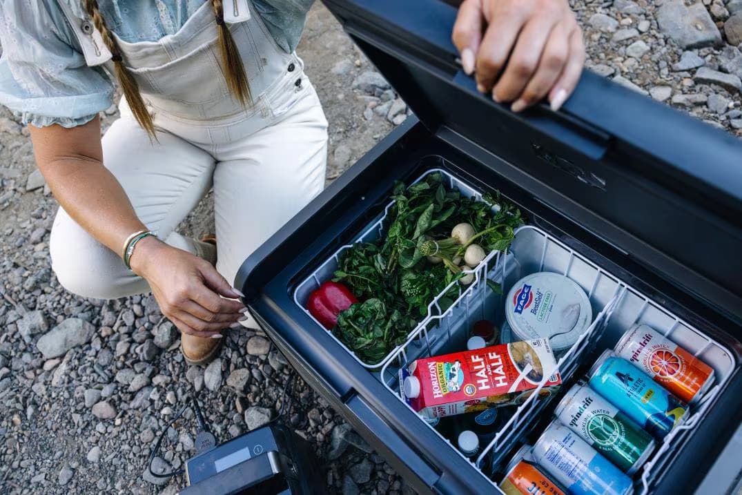 Dometic CFX5 Series portable fridge-freezer on a boat deck replacing traditional ice chest